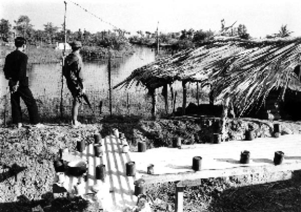 PF platoon on guard in Phu My village, Duip Tuong Province, 1970.